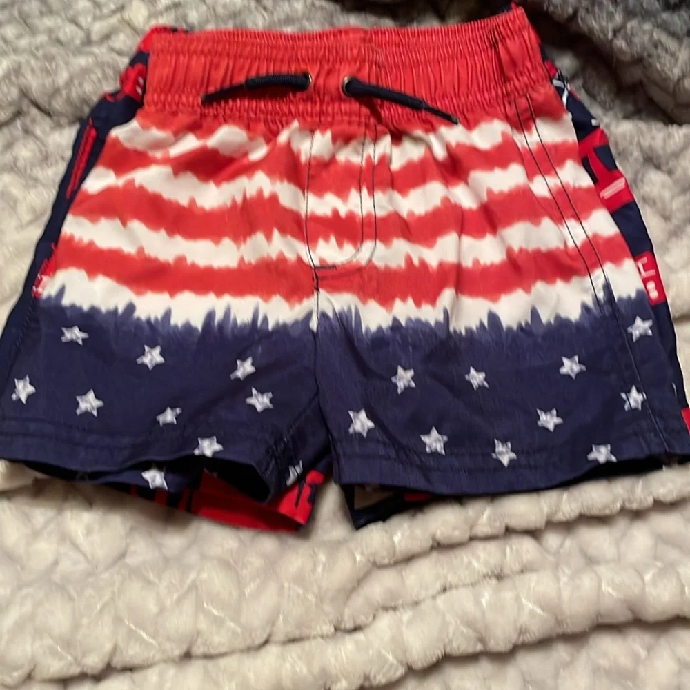 Carter’s~2 Boys Swim Shorts in Red, White and Blue. Elastic Waistband Size:12M